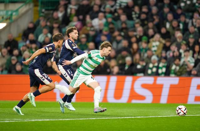 Callum Osmand of Celtic goes to ground under pressure from Sebastian Caceres & Javier Rueda of Celta Vigo Celtic v Celta Vigo, UEFA Europa League, Football, Celtic Park, Glasgow, Scotland, UK - 22 Oct 2026Glasgow Celtic Park Scotland United Kingdom  Copyright: xStuartxWallace Shutterstockx 17230137ay