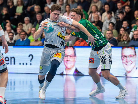 Vukasin Antonijevic (ThSV Eisenach), 41, in a one-on-one battle with Victor Kloeve (Frisch Auf Goeppingen), 07, Frisch Auf Goeppingen vs. ThSV Eisenach, Handball, 1st Bundesliga, Men, 2026–2027 Season, October 23, 2026, Frisch Auf Göppingen vs. ThSV Eisenach, Handball, 1st Bundesliga, Men, 2026–2027 season, October 23, 2026, Göppingen Copyright: xEibner-Pressefoto MichaelxSchmidx EP_MST
