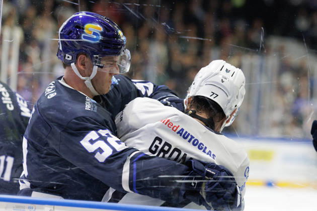 Ice hockey, Eishockey Men - DEL2 - EC Kassel Huskies vs Blue Devils Weiden Season 2026 2027 Johannes Huss (L) of EC Kassel Huskies fights against Tyler Gron (R) of Blue Devils Weiden during the DEL2 ice hockey match between EC Kassel Huskies and Blue Devils Weiden in Kassel, Germany, 23 October 2026. Kassel entered the match in second place in the standings, while Weiden were ranked 12th. Hesse