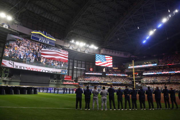 The National Anthem is sung before the start of game one of the 2026 MLB, Baseball Herren, USA World Series between the Milwaukee Brewers and the Tampa Bay Rays at American Family Field in Milwaukee, Wisconsin, on Friday, October 23, 2026.  MIL20261023703 TANNENxMAURY