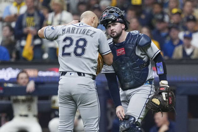 MLB, Baseball Herren, USA World Series Game 1 - Milwaukee Brewers vs Tampa Bay Rays Tampa Bay Rays pitcher Nick Martinez (L) talks with Tampa Bay Rays catcher Liam Hicks (R) during the Major League Baseball (MLB) World Series Game 1 between the Milwaukee Brewers and Tampa Bay Rays at American Family Field in Milwaukee, Wisconsin, USA, 23 October 2026. MILWAUKEE WISCONSIN UNITED STATES  Copyright: xROSSxHARRIEDx