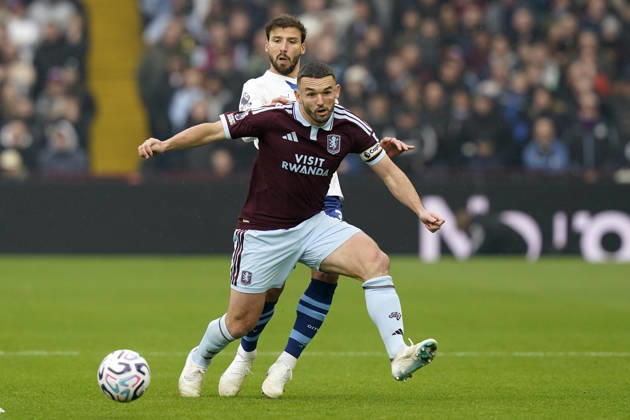 Birmingham, England, 24th October 2026. John McGinn of Aston Villa and Ruben Dias of Manchester City challenge for the ball during the Aston Villa vs Manchester City Premier League match at Villa Park, Birmingham. Picture credit should read: Andrew Yates Sportimage EDITORIAL USE ONLY. No use with unauthorised audio, video, data, fixture lists, club league logos or live services. Online in-match use limited to 120 images, no video emulation. No use in betting, games or single club league player publications. SPI_019_AY_Villa_Man_City SPI-5099-0019