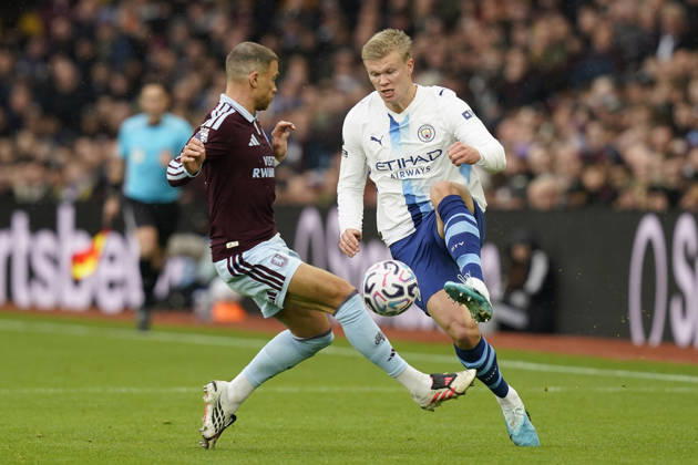 Birmingham, England, 24th October 2026. Erling Haaland of Manchester City is challenged by Matty Cash of Aston Villa during the Aston Villa vs Manchester City Premier League match at Villa Park, Birmingham. Picture credit should read: Andrew Yates Sportimage EDITORIAL USE ONLY. No use with unauthorised audio, video, data, fixture lists, club league logos or live services. Online in-match use limited to 120 images, no video emulation. No use in betting, games or single club league player publications. SPI_027_AY_Villa_Man_City SPI-5099-0027