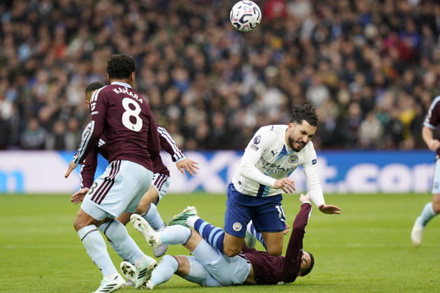 Birmingham, England, 24th October 2026. Rayan Cherki of Manchester City is tackled by Alysson Edward of Aston Villa during the Aston Villa vs Manchester City Premier League match at Villa Park, Birmingham. Picture credit should read: Andrew Yates Sportimage EDITORIAL USE ONLY. No use with unauthorised audio, video, data, fixture lists, club league logos or live services. Online in-match use limited to 120 images, no video emulation. No use in betting, games or single club league player publications. SPI_029_AY_Villa_Man_City SPI-5099-0029