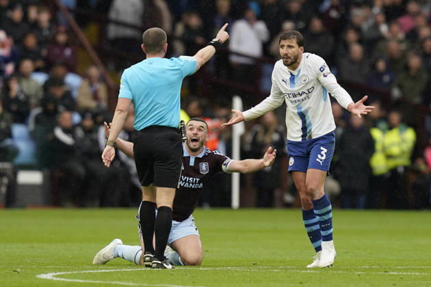 Birmingham, England, 24th October 2026. John McGinn of Aston Villa and Ruben Dias of Manchester City appeal to referee Peter Bankes during the Aston Villa vs Manchester City Premier League match at Villa Park, Birmingham. Picture credit should read: Andrew Yates Sportimage EDITORIAL USE ONLY. No use with unauthorised audio, video, data, fixture lists, club league logos or live services. Online in-match use limited to 120 images, no video emulation. No use in betting, games or single club league player publications. SPI_041_AY_Villa_Man_City SPI-5099-0041
