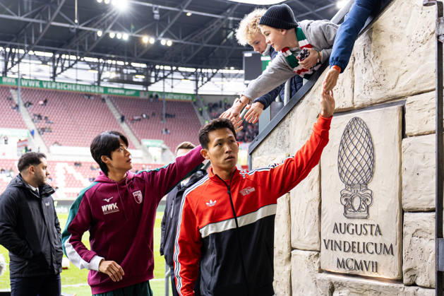 Germany: FC Augsburg vs. Union Berlin, Bundesliga 1, Matchday 7, 2026–27 Season, WWK Arena, Augsburg; Woo Yeong Jeong, 1, FC Union Berlin; 11, Young Woo Seol, FC Augsburg; 7, Augsburg WWK Arena, Bavaria, Germany Copyright: xBenedictxChristx