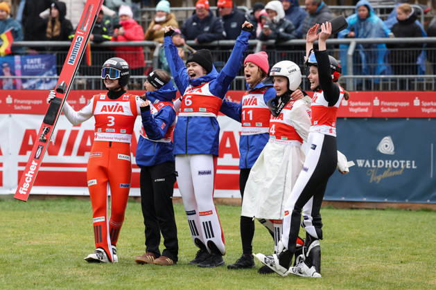 October 24, 2026, Ski Jumping, Women, FIS Summer Grand Prix, 2026 Season, Individual Final Celebration of the day’s victory by Ingvild Synnoeve Midtskogen (NOR), far left. Joining the winner in celebration are Heidi Dyhre Traaserud (NOR), second from left, Anna Odine Stroem (NOR), Josephine Pagnier (FRA), Gyda Westvold Hansen (NOR), and Eirin Maria Kvandal (NOR). Klingenthal Vogtland Arena, Saxony, Germany