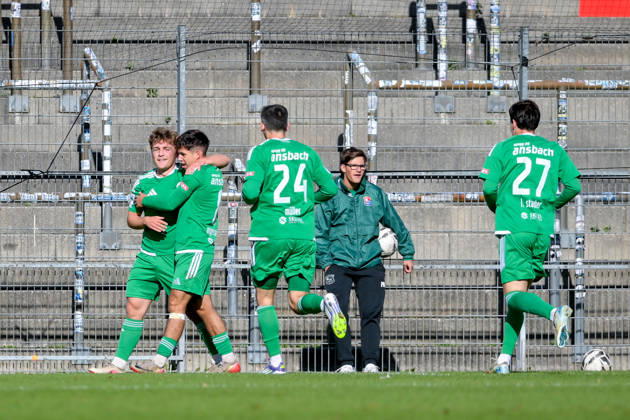Ansbach players celebrating a goal, cheering, goal celebration, goal scored, celebrating the goal, goal, celebration, cheering over the goal that made it 0-1 by Nico Hayer (Ansbach), 28-1 from the left, optimistic, action, October 24, 2026, Unterhaching, Germany, soccer, Bavarian Regional League, SpVgg Unterhaching vs. SpVgg Ansbach xslx