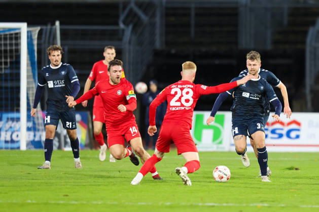 October 24, 2026, Soccer, Men s, Regionalliga Nord, Matchday 15, VfB Oldenburg vs. HSC Hannover: Nico Mai (blue, No. 3) of VfB Oldenburg in a tackle with Jonas Lübke (No. 23) of HSC Hannover