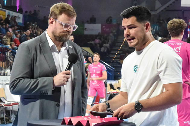 Tomasz Wasilkowski, Head Coach of WWK Volleys Munich; Philipp Ferebauer, arena announcer during the interview; TV, television, microphone; October 24, 2026; Düren, Germany; volleyball; Men s Bundesliga 1; regular season; SWD Powervolleys Düren vs. WWK Volleys Munich xmhx