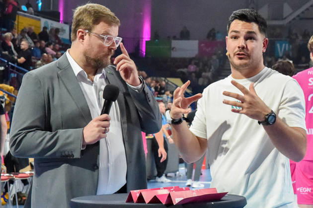 Tomasz Wasilkowski, Head Coach of WWK Volleys Munich; Philipp Ferebauer, arena announcer during the interview; TV, television, microphone; October 24, 2026; Düren, Germany; volleyball; Men s Bundesliga 1; regular season; SWD Powervolleys Düren vs. WWK Volleys Munich xmhx