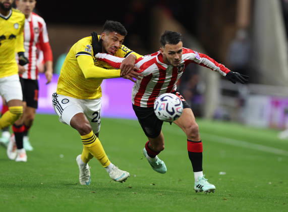Sunderland, England, 25th October 2026. Enzo Le Fee (R) of Sunderland in action with James Justin of Leeds United during the Sunderland vs Leeds United Premier League match at the Stadium of Light, Sunderland. Picture credit should read: Nigel Roddis Sportimage EDITORIAL USE ONLY. No use with unauthorised audio, video, data, fixture lists, club league logos or live services. Online in-match use limited to 120 images, no video emulation. No use in betting, games or single club league player publications. SPI_011_NR_SUND_LEED SPI-5102-0010