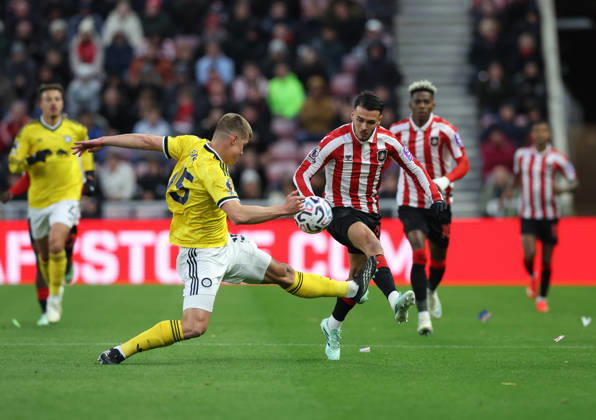 Sunderland, England, 25th October 2026. Enzo Le Fee (R) of Sunderland in action with Jaka Bijol of Leeds United during the Sunderland vs Leeds United Premier League match at the Stadium of Light, Sunderland. Picture credit should read: Nigel Roddis Sportimage EDITORIAL USE ONLY. No use with unauthorised audio, video, data, fixture lists, club league logos or live services. Online in-match use limited to 120 images, no video emulation. No use in betting, games or single club league player publications. SPI_016_NR_SUND_LEED SPI-5102-0014