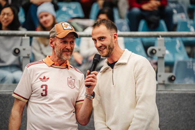 Women s Volleyball, 2026–2027 Season, DEKRA 1 Volleyball Bundesliga: ETV Hamburger Volksbank Volleys vs. USC Münster, October 25, 2026. Professional beach volleyball player Clemens Wickler (right) is interviewed by Norman Diercks (left) at the CU Arena in Hamburg, Germany.