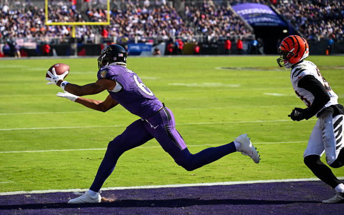 Baltimore Ravens wide receiver Ja kobi Lane (6) is unable to complete an attempted touchdown pass in the end zone under pressure from Cincinnati Bengals cornerback D.J. Ivey (38) during the second quarter at M&T Bank Stadium in Baltimore, Maryland, on Sunday, October 25, 2026.  BAL20261025101 DAVIDxTULIS