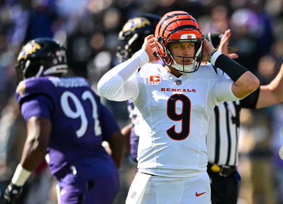 Cincinnati Bengals quarterback Joe Burrow (9) looks to the sideline for instructions against the Baltimore Ravens during the first quarter at M&T Bank Stadium in Baltimore, Maryland, on Sunday, October 25, 2026.  BAL20261025105 DAVIDxTULIS