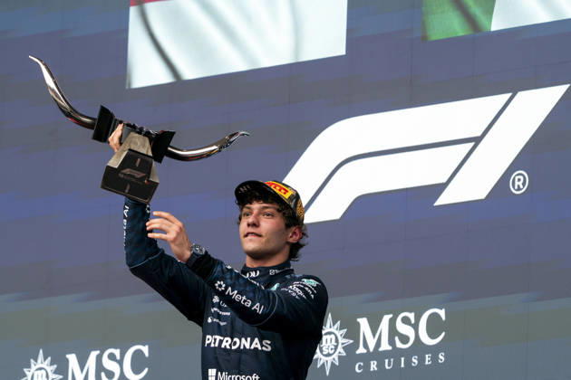 Italian Formula One driver Andrea Kimi Antonelli of Mercedes-AMG Petronas holds the winner s trophy on the podium for the Formula One United States Grand Prix at the Circuit of the Americas in Austin, Texas on Sunday, October 25, 2026.  AUS2026102536 GREGxNASH