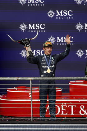 F1 - UNITED STATES GRAND PRIX 2026 KIMI ANTONELLI Andrea (ita), Mercedes AMG F1 Team W17, portrait podium celebration moet during the 2026 Formula 1 United States Grand Prix, 18th round of the 2026 Formula One World Championship, WM, Weltmeisterschaft from October 23 to 25, 2026 on the Circuit of the America, in Austin, Texas, United States of America - AustinUnited States  Copyright: xXavixBonillax