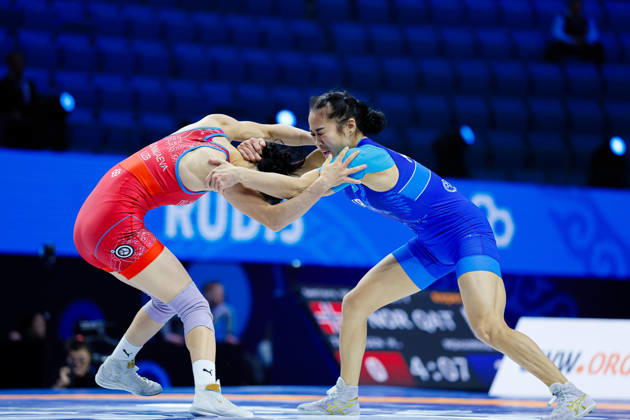 Senior World Championships, 50 kg Open Weight: Zeinep Bayanova (KAZ) vs. Aktenge Keunimjaeva (UZB) Copyright: xKostadinxAndonovx