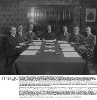The Television Advisory Committee ( appointed only four days ago by Sir Kingsley Wood the Postmaster General ) held their first meeting at the General Post Office building in London to discuss the planning and early development of the television service - photo shows left to right Mr Noel Ashbridge of the BBC Mr O F Browne Sir Frank Smith Lord Selsdon the Chairman of the Committee Mr F W Phillips the Assistant Secretary of the GPO Colonel Angwin the Assistant Engineering Chief of the GPO and Mr V Roberts the Secretary of the Committee at their meeting at the GPO in London February 5th 1935, Fernsehen, Fernsehshow, Fernsehstar, Fernseher  UnitedArchives00952620