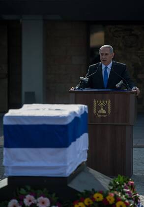60915444 Israeli Prime Minister Benjamin Netanyahu addresses a state memorial ceremony of former Israeli Prime Minister Ariel Sharon at Israel s Knesset (parliament) in Jerusalem, on Jan. 13, 2014. The state memorial service was held here on Monday attended by international leaders, including U.S. Vice President Joe Biden and Quartet representative and former British Prime Minister Tony Blair. Former Israeli Prime Minister Ariel Sharon, a controversial figure that altered the course of the Middle East, died at a hospital near Tel Aviv in central Israel at the age of 85 on Saturday, Monday, 13th January 2014. Picture by imago i-Images UK ONLY imagox xi-Images IIM-1257-0019