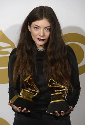 Singer Lorde holds the Grammy Awards she won for best pop solo performance - Royals , backstage at the 56th annual Grammy Awards at Staples Center in Los Angeles on January 26, 2014.  LAP20140126834