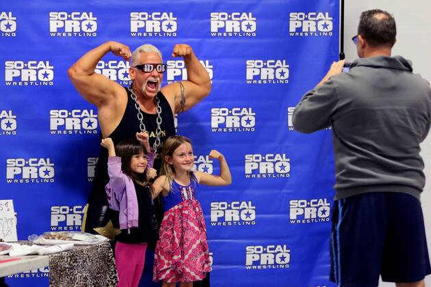 October 15, 2016 - Oceanside, California, USA - 10 15 2016_Oceanside, CA_SoCal Pro Wrestling s Rumble in Oceanside event at the Oceanside Boys & Girls Club gymnasium. Prior to the evening s first bout wrestler Anthony Idol has his photo taken with young fans._Photo by Oceanside USA - ZUMAn47_