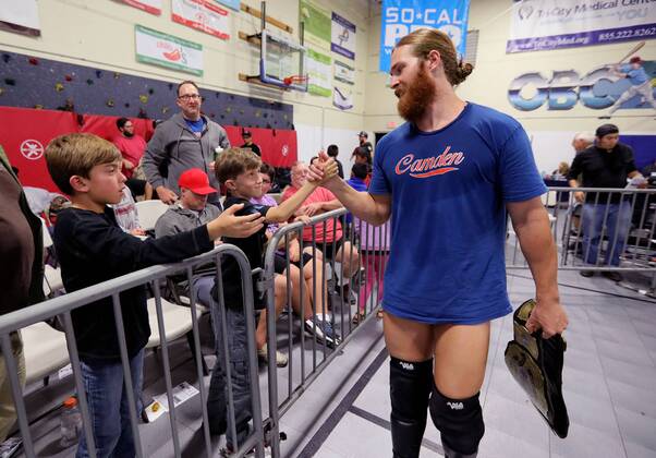 October 15, 2016 - Oceanside, California, USA - 10 15 2016_Oceanside, CA_SoCal Pro Wrestling s Rumble in Oceanside event at the Oceanside Boys & Girls Club gymnasium. Wrestler Mike Camden greets young fans before his match._Photo by Oceanside USA - ZUMAn47_