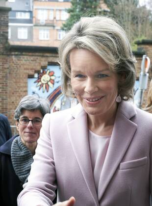 King Philippe - Filip of Belgium and Queen Mathilde of Belgium pictured during a Royal visit to non-profit vzw Buurtwerk Chambery asbl Buurtwerk Chambery, on Thursday 22 December 2016, in Etterbeek, Brussels. Â