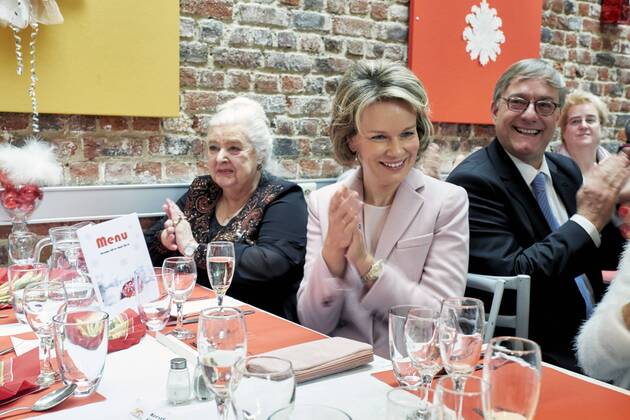 King Philippe - Filip of Belgium and Queen Mathilde of Belgium pictured during a Royal visit to non-profit vzw Buurtwerk Chambery asbl Buurtwerk Chambery, on Thursday 22 December 2016, in Etterbeek, Brussels. Â
