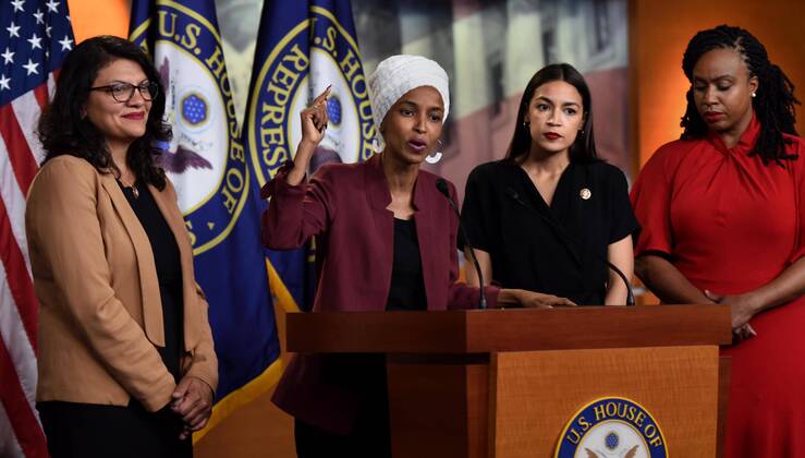 July 15, 2019 - Washington, District of Columbia, USA - July 15, 2019, Washington, District of Columbia, USA - U.S. Rep. ILHAN OMAR (D-MN) speaks at a press conference and Reps. RASHIDA TLAIB (D-MI), ALEXANDRIA OCASIO-CORTEZ (D-NY), AYANNA PRESSLEY (D-MA) listen. Four Democratic progressive Congresswomen make a statement during a press conference at the U.S. Capitol about President Trump s remarks telling them to go back to their home countries which they deemed blatantly racist attacks. Washington USA - ZUMAm67_ 20190715_zaf_m67_049 Copyright: xCarolxGuzyx
