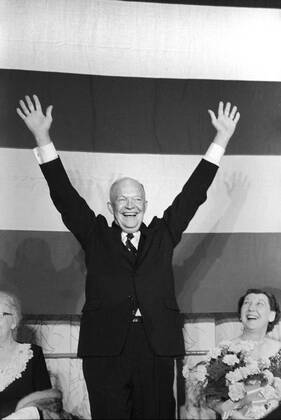 U.S. President Dwight Eisenhower with Raised Arms, First Lady Mamie Eisenhower Looking on, Election Night, November 6, 1956  Copyright: xCircaxImagesx ghi-circa07743