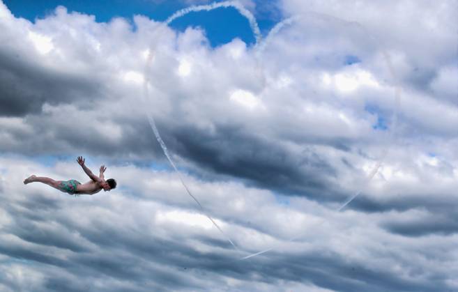 EDITORIAL USE ONLY Red Bull Matadors Aerobatic Display Over The East Coast of Ireland 2 7 2020 Pictured today at the forty foot, the Red Bull Matadors piloted by Paul Bonhomme & Steve Jones, took to the skies to perform a thrilling aerobatic display along the east coast of Ireland as Freddy Allen dives into the sea GivesYouWings The Red Bull Matadors 2 7 2020 Copyright: x INPHO AlanxMetcalfex 0047500542st