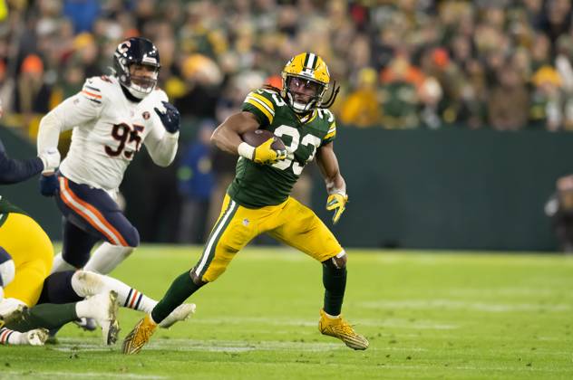 NFL 2024: Bears vs Packers JAN 07 January 7, 2024: Chicago Bears defensive end DeMarcus Walker (95) chases Green Bay Packers running back Aaron Jones (33) in Green Bay, WI. Kirsten Schmitt Cal Sport Media., Credit:Kirsten Schmitt Avalon United States of America, Wisconsin, Green Bay, Lambeau Field  Copyright: xKirstenxSchmittx xAvalonx 0835071094
