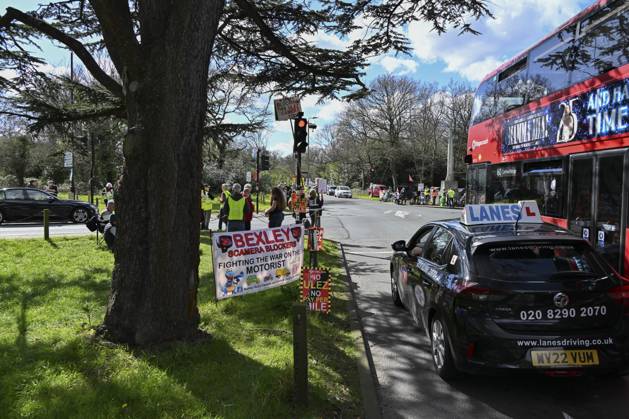 Protesters during a protest against the Ultra Low Emission Zone at the Chislehurst War Memorial in Chislehurst, London. ULEZ cameras in Chislehurst and other nearby areas have been vandalised in previous months.  Copyright: xAlanxStanfordx