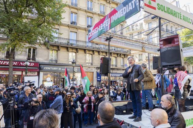 Paris, France October 5, 2024 - Demonstration organized by the Association France Palestine SolidaritÃ (AFPS) to denounce Israel s war in Gaza and Lebanon. Pro-Palestinian demonstrators are participating in national marches across EMEA to mark the start of Israel s war in Gaza after the Hamas attacks of October 7th 2023. They are calling for a ceasefire in the Middle East and an end to the supply of arms to Israel - Jean-Luc Melenchon GUERRE, MANIFESTATION PRO PALESTINIENNE, GAZA, PROCHE ORIENT, MOYEN ORIENT, MIDDLE EAST, LIBAN, CONFLIT, GEOPOLITIQUE, ISRAEL, MANIFESTANTS, ARABES, POLITIQUE, GOUVERNEMENT, DIASPORA, MOUVEMENT DE RESISTANCE, TERRITOIRES PALESTINIENS OCCUPES  Copyright: xVincentxIsorex