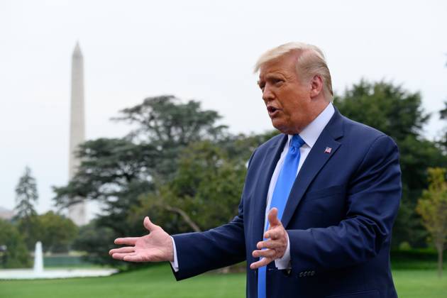 President Donald Trump Speaks to Members of the Media United States President Donald J. Trump speaks to members of the media on the South Lawn of the White House before boarding Marine One in Washington, D.C., U.S., on Thursday, September 24, 2020. Photographer: Erin Scott Bloomberg Credit: Erin Scott Pool via CNP AdMedia Washington District of Columbia United States of America EDITORIAL USE ONLY  Copyright: xx 09242020-ES-Trump-418 CNP AdMediax admphotostwo720056