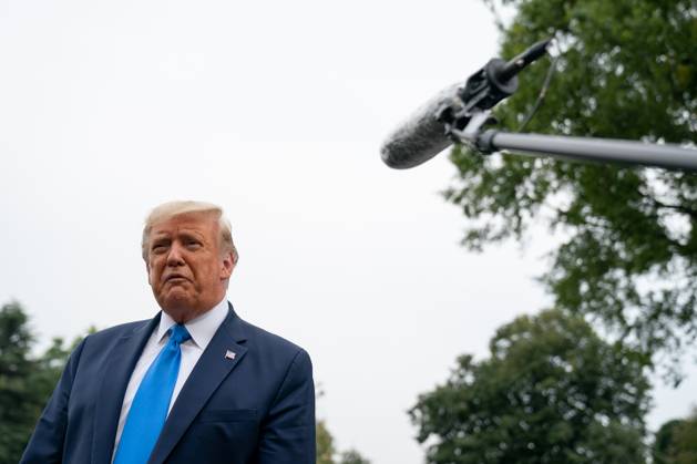 President Donald Trump Speaks to Members of the Media United States President Donald J. Trump speaks to members of the media on the South Lawn of the White House before boarding Marine One in Washington, D.C., U.S., on Thursday, September 24, 2020. Photographer: Erin Scott Bloomberg Credit: Erin Scott Pool via CNP AdMedia Washington District of Columbia United States of America EDITORIAL USE ONLY Copyright: xx 09242020-ES-Trump-415 CNP AdMediax admphotostwo720057