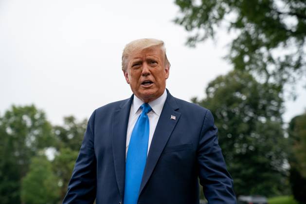 President Donald Trump Speaks to Members of the Media United States President Donald J. Trump speaks to members of the media on the South Lawn of the White House before boarding Marine One in Washington, D.C., U.S., on Thursday, September 24, 2020. Photographer: Erin Scott Bloomberg Credit: Erin Scott Pool via CNP AdMedia Washington District of Columbia United States of America EDITORIAL USE ONLY Copyright: xx 09242020-ES-Trump-411 CNP AdMediax admphotostwo720133