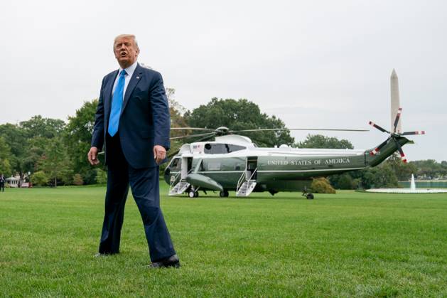 President Donald Trump Speaks to Members of the Media United States President Donald J. Trump speaks to visitors on the South Lawn of the White House before boarding Marine One in Washington, D.C., U.S., on Thursday, September 24, 2020. Credit: Erin Scott Pool via CNP AdMedia Washington District of Columbia United States of America EDITORIAL USE ONLY Copyright: xx 09242020-ES-Trump-425 CNP AdMediax admphotostwo720134