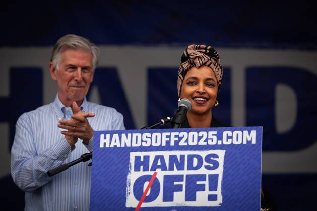 More than 100,000 attend anti-Trump protest in Washington, DC Rep. Ilhan Omar (D-MN) speaks to more than 100,000 people protesting the Trump administration™s massive employment and funding cuts, and authoritarian seizure of power, in Washington, U.S., on April 5, 2025. Most of the closures and cuts have been executed by Elon Musk™s Department of Government Efficiency (DOGE), and numerous lawsuits have been filed to contest the constitutionality of DOGE and specific actions it has taken. Washington DC United States  Copyright: xAllisonxBaileyx originalFilename: bailey-morethan250405_npVxI.jpg