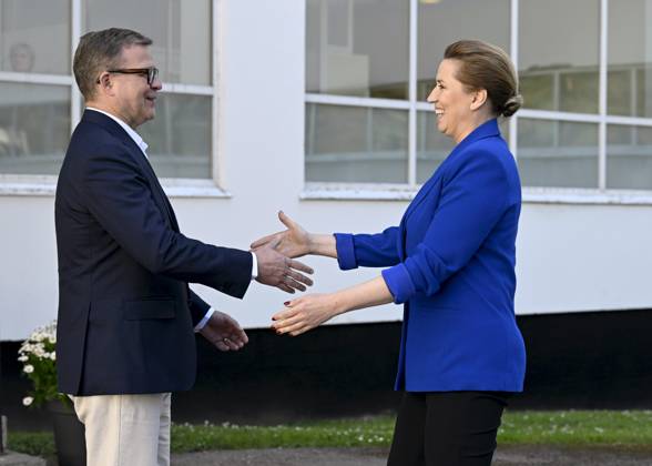 Finnish Prime Minister Petteri Orpo (L) welcomes Danish Prime Minister Mette Frederiksen at the Nordic Prime Ministers Summer Meeting at the Paimio Sanatorium in Paimio, Finland, on May 26, 2025. Finland and Åland together host the informal summer meeting. The discussions of the meeting will focus on two themes: competitiveness and strengthening comprehensive security. Paimio Finland Copyright: xRonixRekomaax LKFTJK20250526112632CQAR