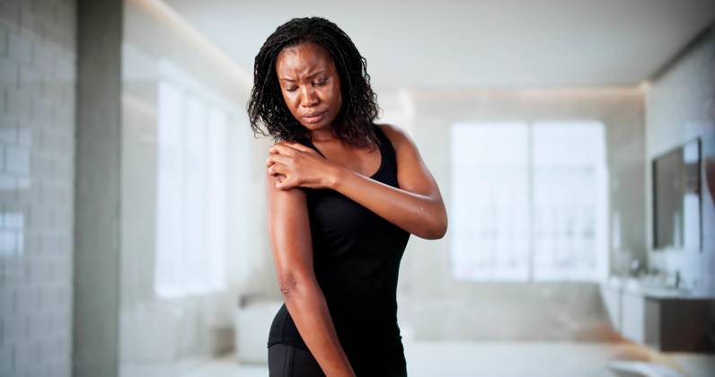 African American Woman Scratches Dry, Itchy Skin Allergy African American Woman Scratches Dry, Itchy Skin Allergy On Couch., model released, , property released, , 98158698.jpg RECORD DATE NOT STATED