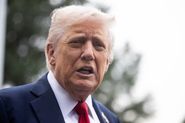 President Donald Trump speaks with reporters as he walks on the South Lawn of the White House on his way to board Marine One on Tuesday, September 30, 2025. He is on his way to Quantico to meet with military officers.  WASP2025093002 FrancisxChung
