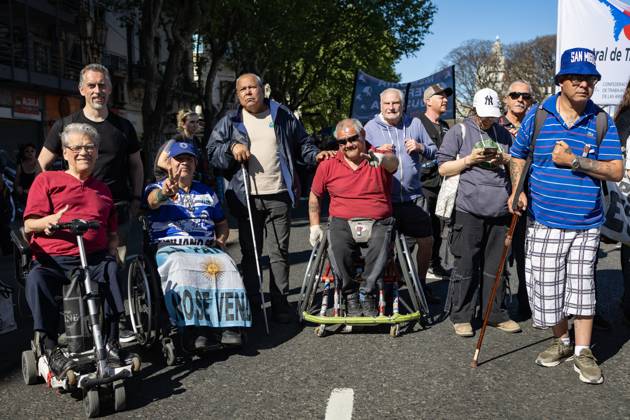 October 1, 2025, Buenos Aires, Buenos Aires, Argentina: Disabled citizens and pensioners pose for the camera during a retireesÃ¢â‚¬â ¢ march against President Javier MileiÃ¢â‚¬â ¢s austerity measures. Buenos Aires Argentina - ZUMAp265 20251001_zip_p265_003 Copyright: xDelfinaxCorberaxPix