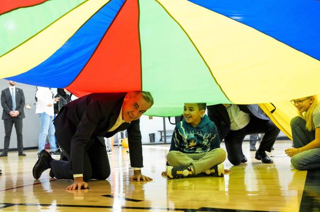 October 10, 2025, Ottawa, On, CAN: Prime Minister Mark Carney plays a parachute game with children at a community centre, before participating in an announcement in Ottawa, on Friday, Oct. 10, 2025. Ottawa CAN - ZUMAc35_ 20251010_zaf_c35_006 Copyright: xJustinxTangx