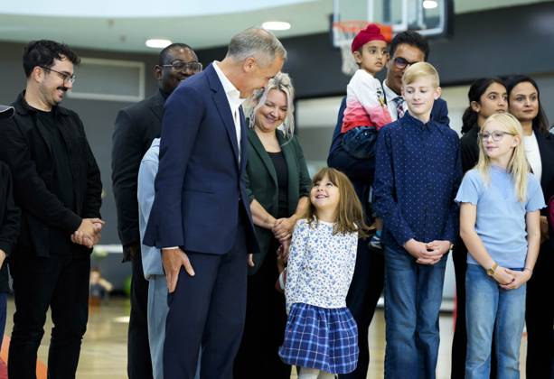 October 10, 2025, Ottawa, On, CAN: Prime Minister Mark Carney jokes with a youngster about the posture they will have to take as they stand in the background before an announcement at a community centre in Ottawa, on Friday, Oct. 10, 2025. Ottawa CAN - ZUMAc35_ 20251010_zaf_c35_022 Copyright: xJustinxTangx