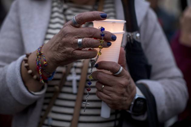 October 11, 2025, Madrid, Madrid, Spain: Members of the Venezuelan community in Madrid holding candles and Venezuelan flags in Opera Square in downtown Madrid, during a vigil to pray the rosary for the beatification of Venezuelans Jose Gregorio Hernandez and Carmen Rendiles on October 19, 2027, in St. Peter s Square, Rome. Madrid Spain - ZUMAs296 20251011_znp_s296_002 Copyright: xLuisxSotox