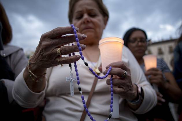 October 11, 2025, Madrid, Madrid, Spain: Members of the Venezuelan community in Madrid holding candles and Venezuelan flags in Opera Square in downtown Madrid, during a vigil to pray the rosary for the beatification of Venezuelans Jose Gregorio Hernandez and Carmen Rendiles on October 19, 2027, in St. Peter s Square, Rome. Madrid Spain - ZUMAs296 20251011_znp_s296_011 Copyright: xLuisxSotox