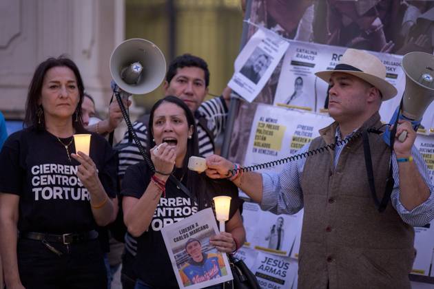 October 11, 2025, Madrid, Madrid, Spain: Members of the Venezuelan community in Madrid holding candles and Venezuelan flags in Opera Square in downtown Madrid, during a vigil to pray the rosary for the beatification of Venezuelans Jose Gregorio Hernandez and Carmen Rendiles on October 19, 2027, in St. Peter s Square, Rome. Madrid Spain - ZUMAs296 20251011_znp_s296_006 Copyright: xLuisxSotox